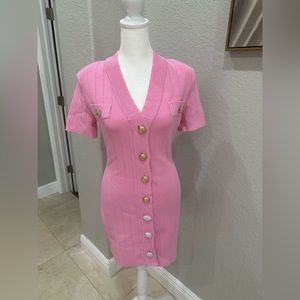 Knit dress has not been worn.